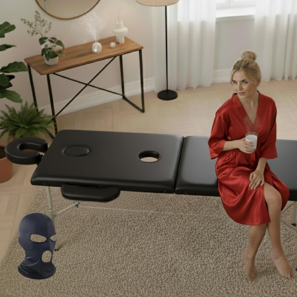 Padded massage table set up at home for a couples massage session