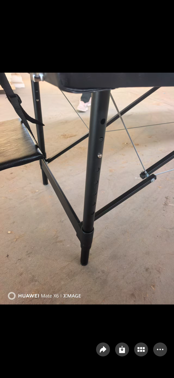 Underside of a table showing cable tensioning